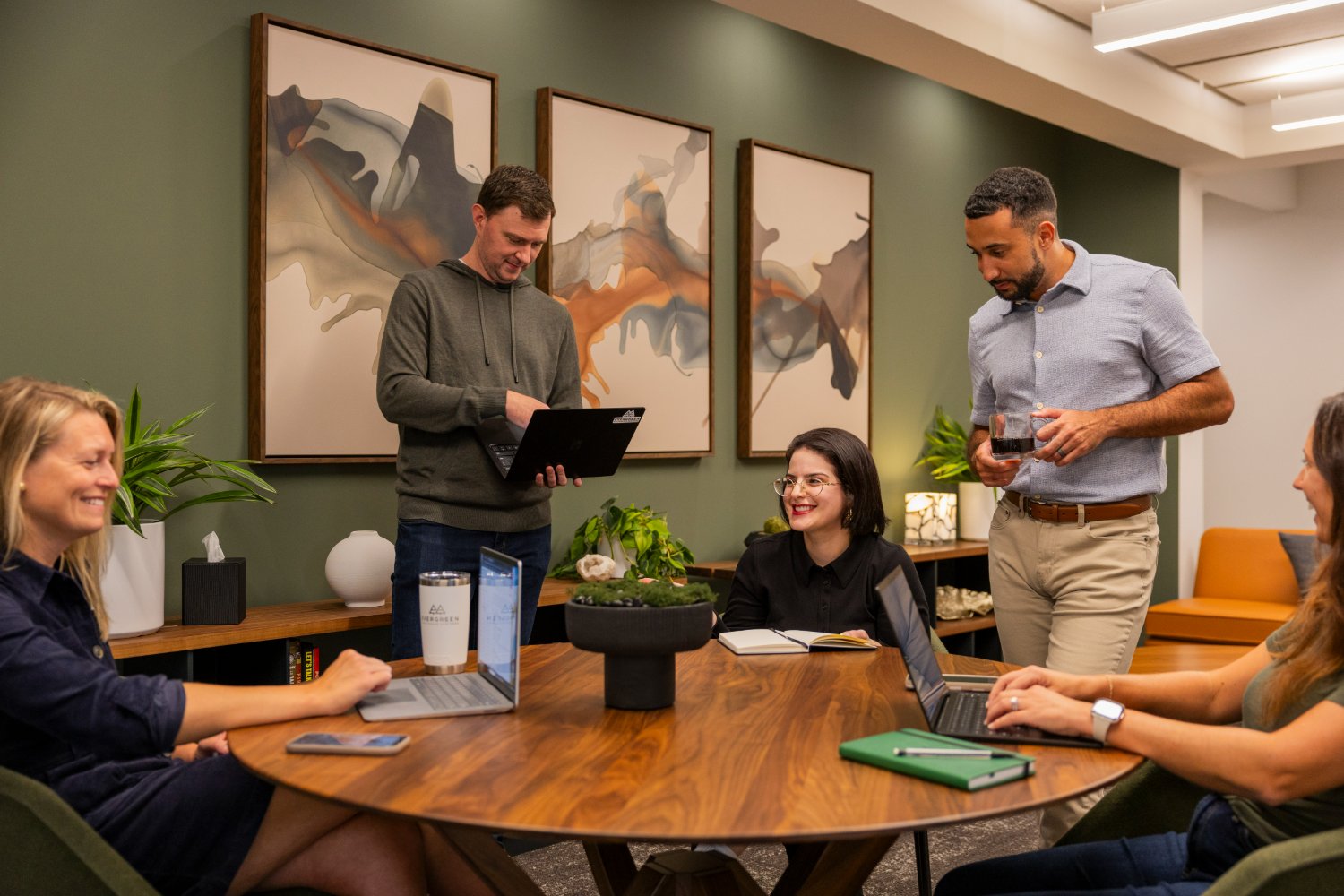 Evergreen consultants collaborating in a meeting